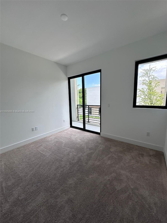 5463 W Oak Way, Dania Beach, FL 33314 - carpeted spare room with baseboards
