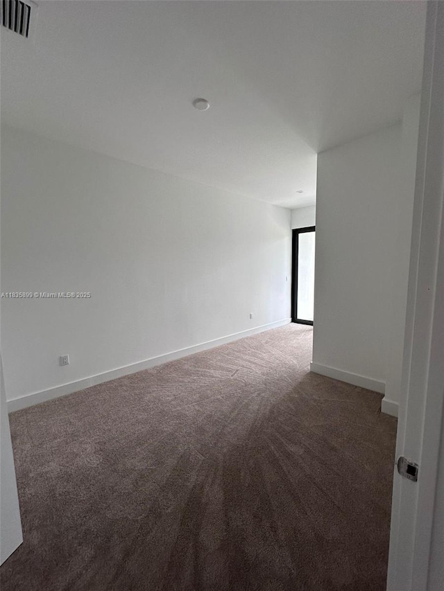5463 W Oak Way, Dania Beach, FL 33314 - empty room featuring carpet flooring and baseboards