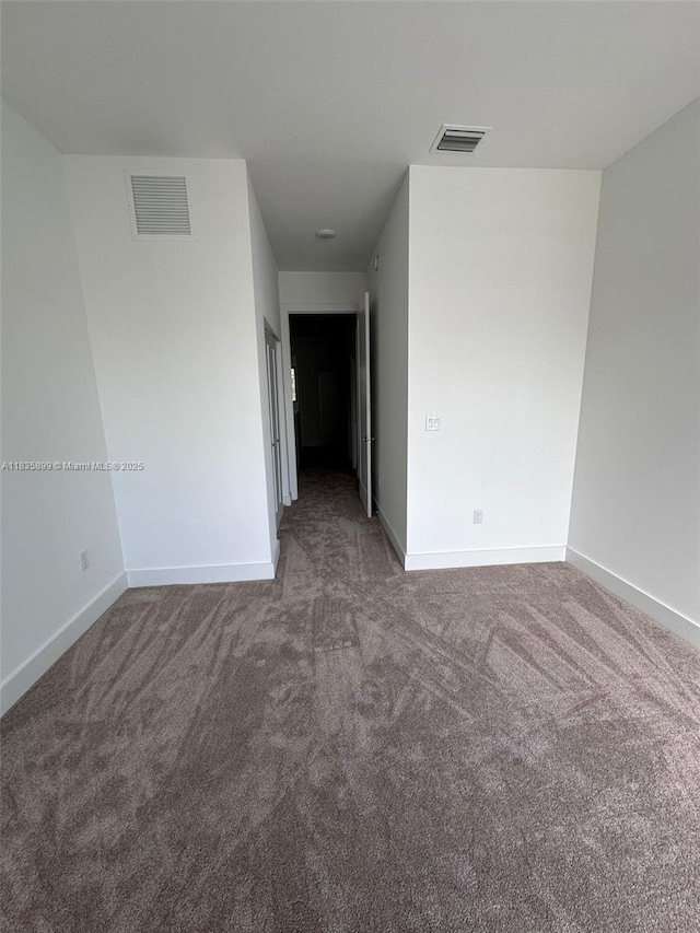 5463 W Oak Way, Dania Beach, FL 33314 - carpeted empty room with baseboards