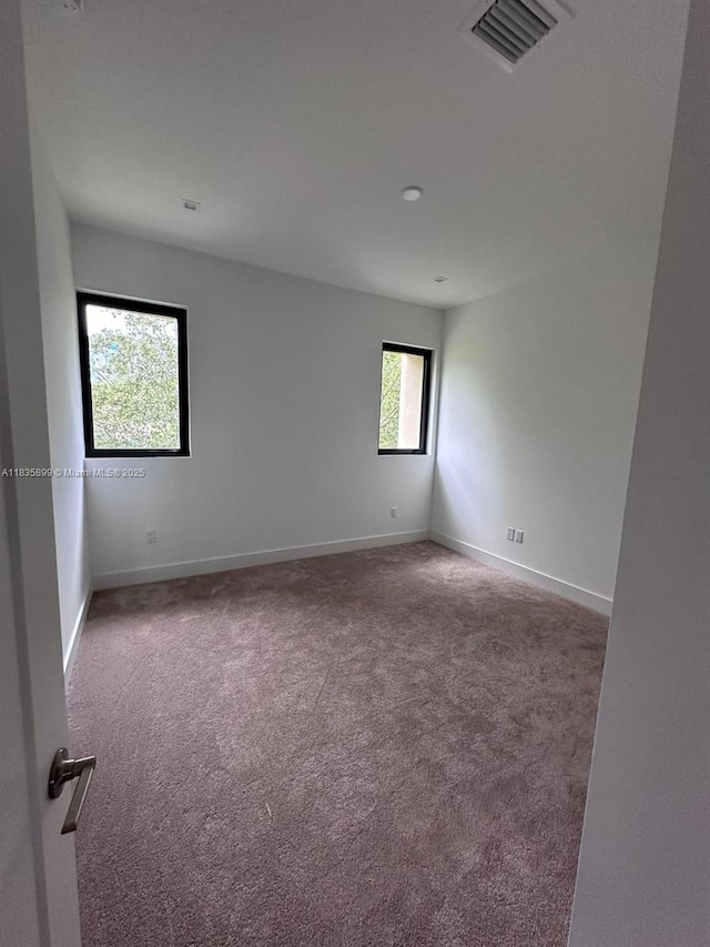 5463 W Oak Way, Dania Beach, FL 33314 - spare room with carpet