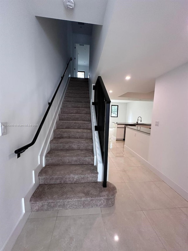 5463 W Oak Way, Dania Beach, FL 33314 - stairs with tile patterned flooring and recessed lighting
