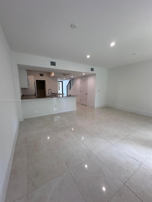 5463 W Oak Way, Dania Beach, FL 33314 - unfurnished living room featuring recessed lighting, stairway, and light marble finish floors