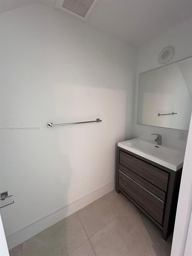 5463 W Oak Way, Dania Beach, FL 33314 - bathroom featuring vanity and tile patterned flooring