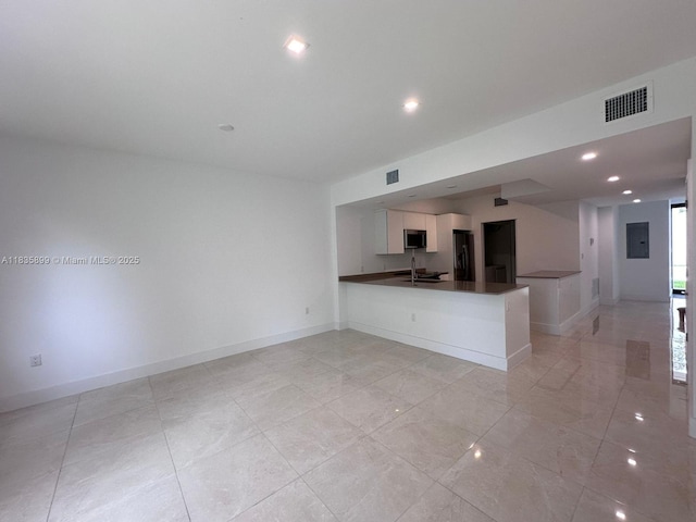 5463 W Oak Way, Dania Beach, FL 33314 - unfurnished living room with electric panel and recessed lighting