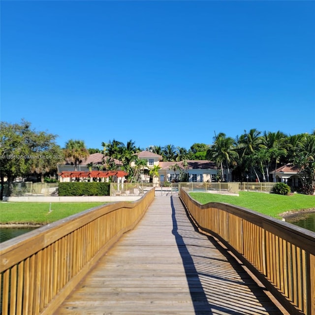 2463 Centergate Dr Unit 103, Miramar, FL 33025 - dock area featuring a yard and a water view