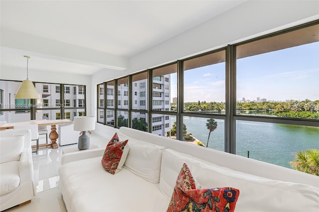 9102 W Bay Harbor Dr Unit 5-D, Bay Harbor Islands, FL 33154 - sunroom featuring a water view, a view of city, and beamed ceiling