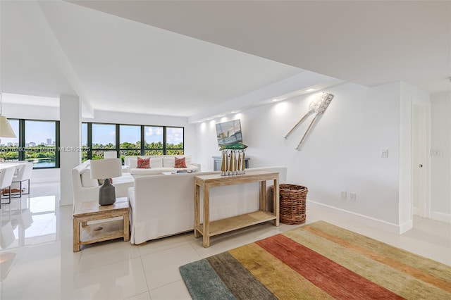 9102 W Bay Harbor Dr Unit 5-D, Bay Harbor Islands, FL 33154 - living area with tile patterned floors and baseboards