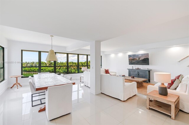 9102 W Bay Harbor Dr Unit 5-D, Bay Harbor Islands, FL 33154 - living area with light tile patterned flooring