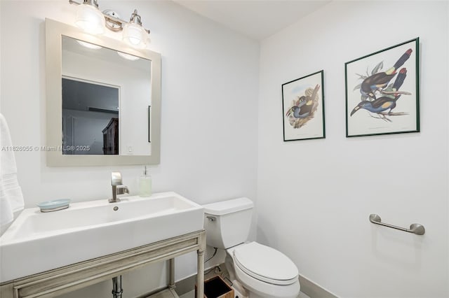 9102 W Bay Harbor Dr Unit 5-D, Bay Harbor Islands, FL 33154 - bathroom with toilet and a sink