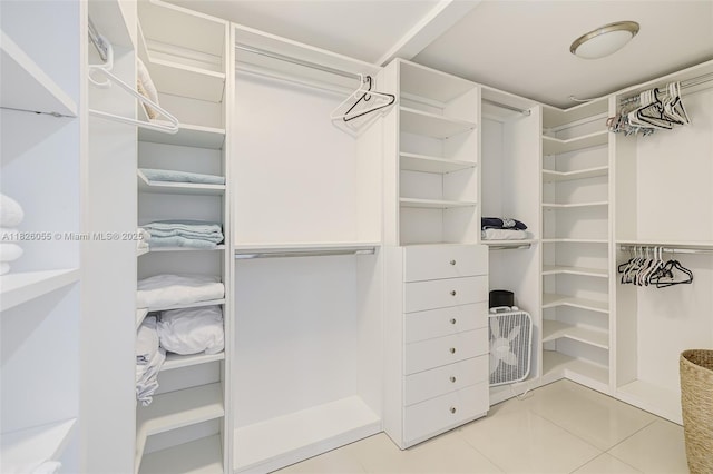 9102 W Bay Harbor Dr Unit 5-D, Bay Harbor Islands, FL 33154 - spacious closet featuring tile patterned flooring