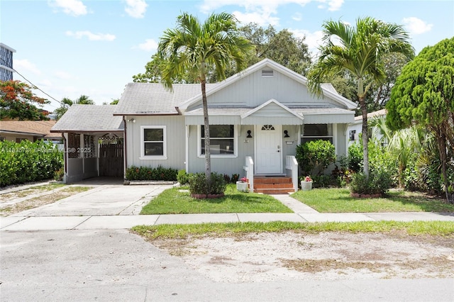 2946 SW 26th St, Miami, FL 33133 - bungalow with driveway and roof with shingles