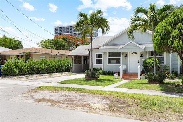 2946 SW 26th St, Miami, FL 33133 - bungalow-style home featuring driveway