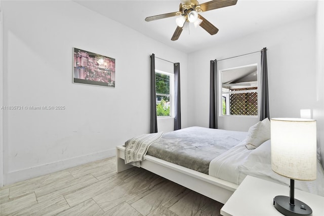 2946 SW 26th St, Miami, FL 33133 - bedroom with baseboards and ceiling fan