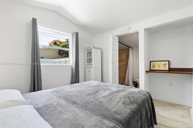 2946 SW 26th St, Miami, FL 33133 - bedroom featuring lofted ceiling and wood finished floors