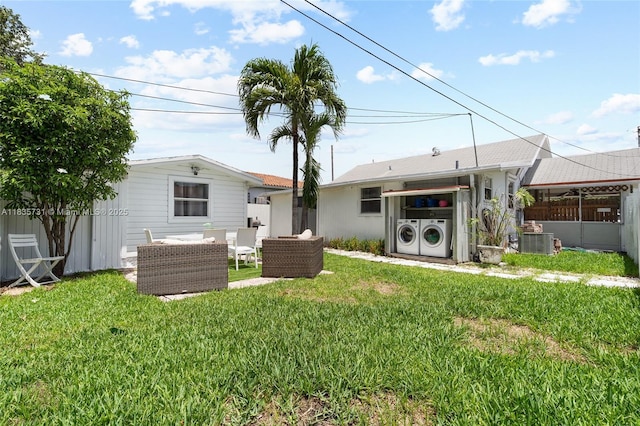 2946 SW 26th St, Miami, FL 33133 - rear view of property featuring washing machine and dryer