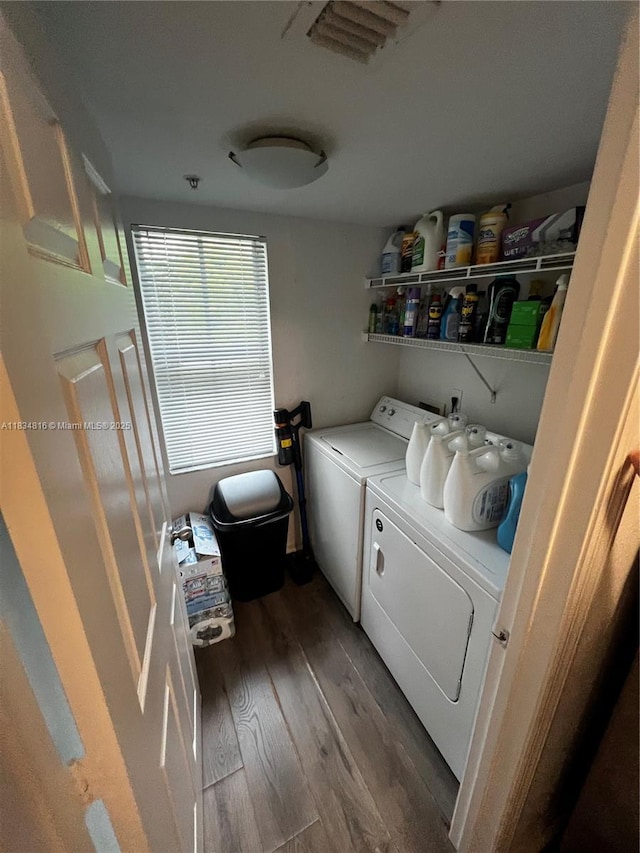 2548 Centergate Dr Unit 301, Miramar, FL 33025 - laundry room featuring washer and clothes dryer and wood finished floors