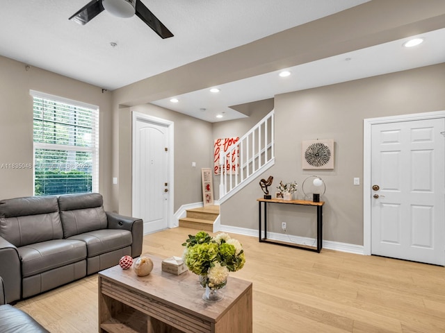 2249 NE 9th Ave, Wilton Manors, FL 33305 - living room with a ceiling fan, light wood-style floors, stairs, and recessed lighting