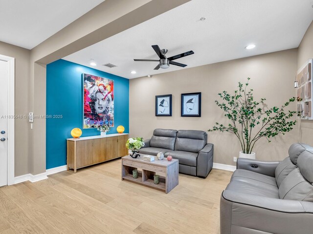 2249 NE 9th Ave, Wilton Manors, FL 33305 - living area with french doors, a ceiling fan, light wood-type flooring, and recessed lighting