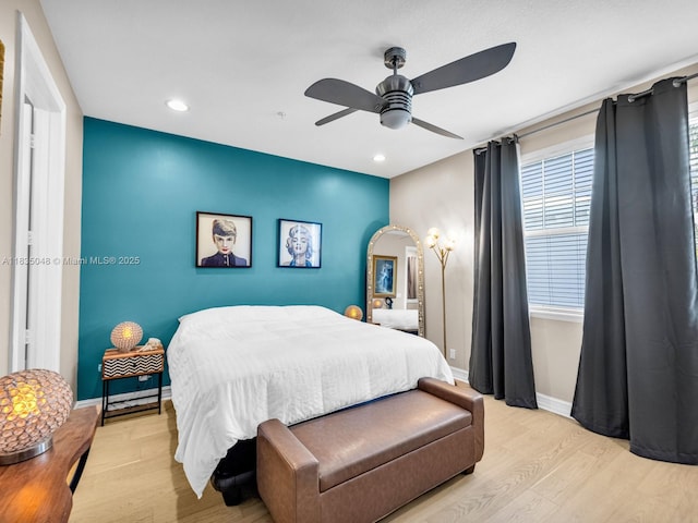 2249 NE 9th Ave, Wilton Manors, FL 33305 - bedroom featuring wood finished floors, recessed lighting, multiple windows, and ceiling fan