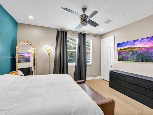 2249 NE 9th Ave, Wilton Manors, FL 33305 - bedroom with wood finished floors, recessed lighting, and a ceiling fan