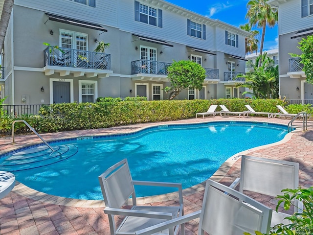 2249 NE 9th Ave, Wilton Manors, FL 33305 - community pool featuring a patio
