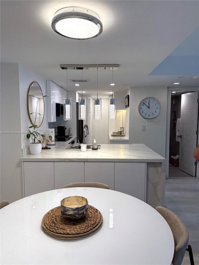 770 Claughton Island Dr Unit 1503, Miami, FL 33131 - dining room featuring wood finished floors and recessed lighting
