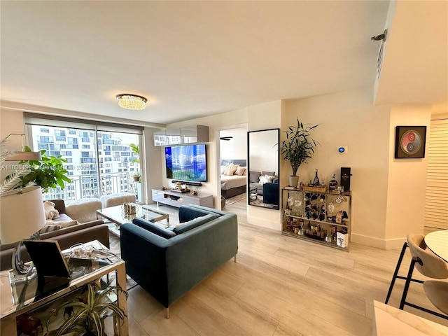 770 Claughton Island Dr Unit 1503, Miami, FL 33131 - living area featuring light wood-style floors and baseboards