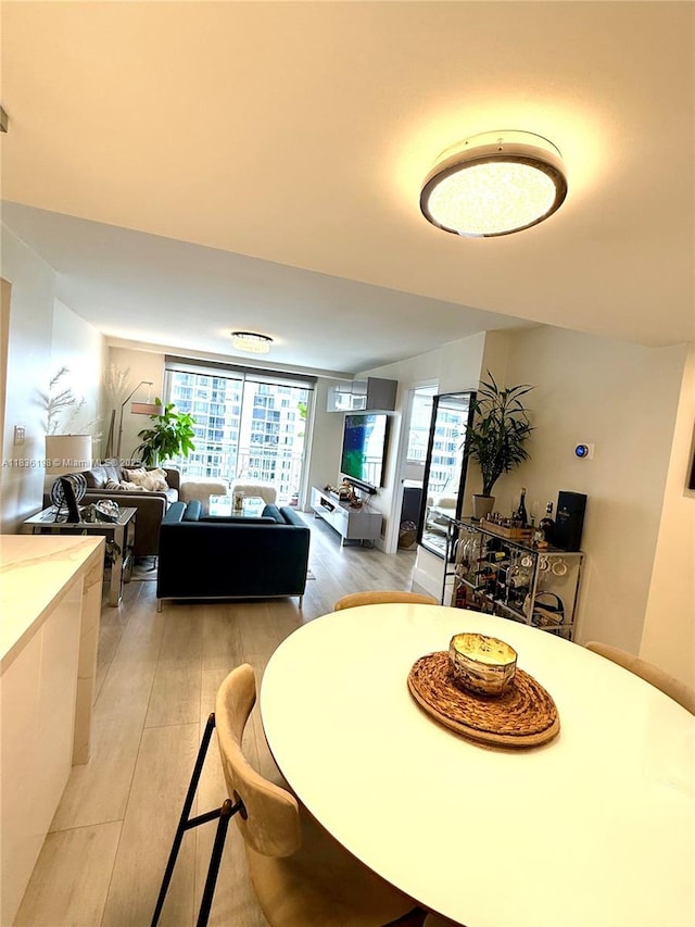 770 Claughton Island Dr Unit 1503, Miami, FL 33131 - dining area featuring light wood finished floors