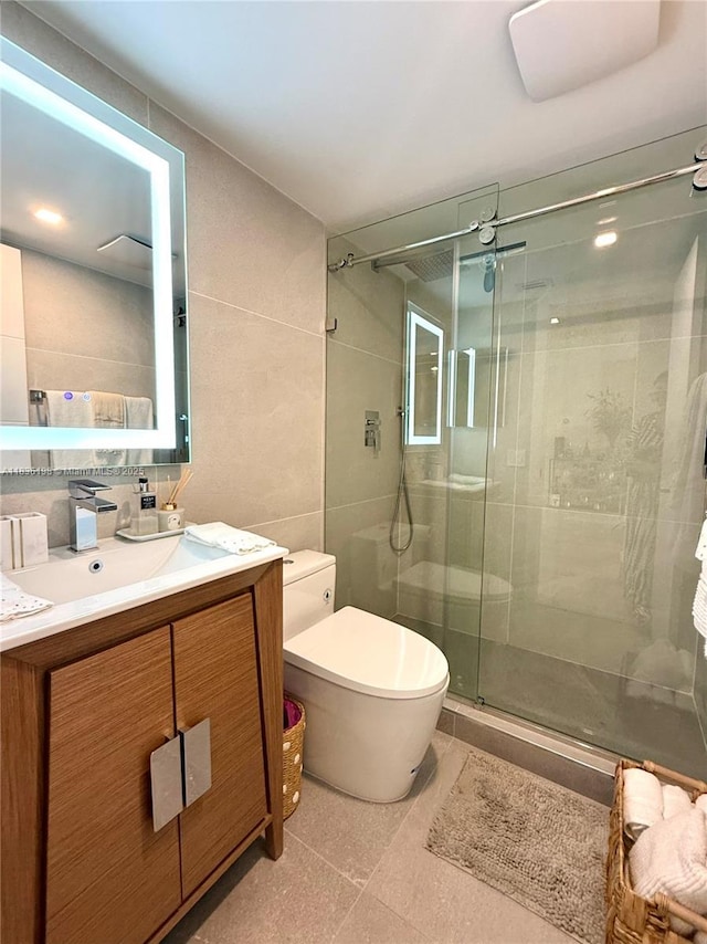 770 Claughton Island Dr Unit 1503, Miami, FL 33131 - full bath with tile walls, a stall shower, vanity, and tile patterned floors