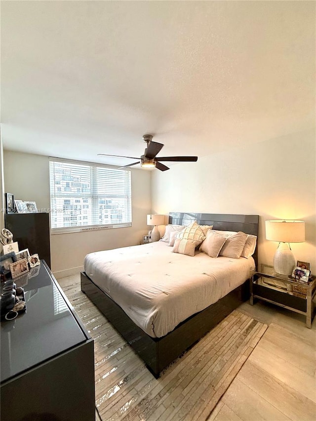 770 Claughton Island Dr Unit 1503, Miami, FL 33131 - bedroom featuring light wood-style flooring and a ceiling fan