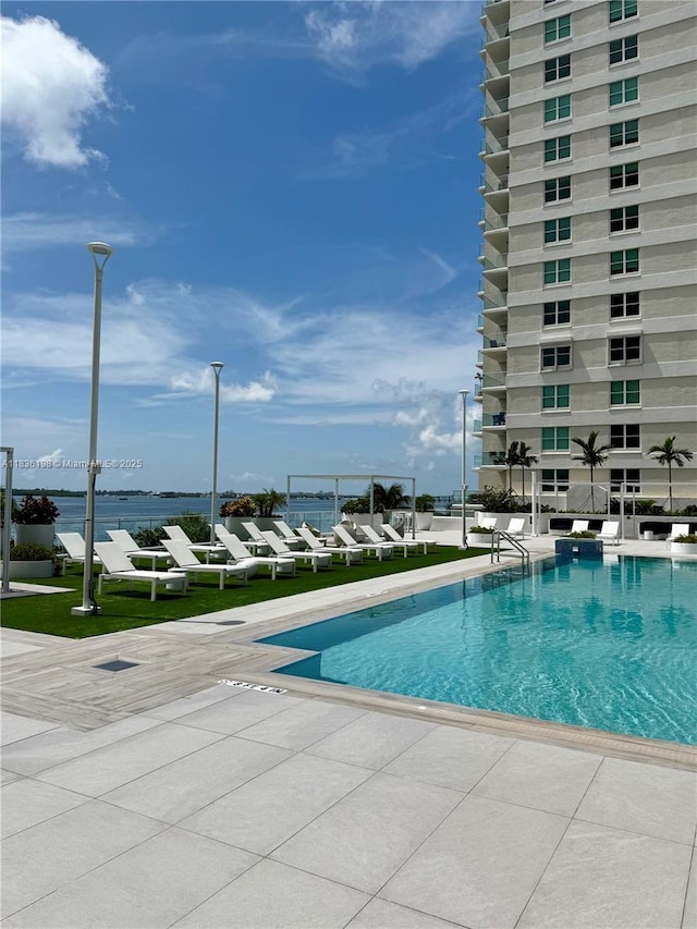 770 Claughton Island Dr Unit 1503, Miami, FL 33131 - community pool featuring a patio and a water view