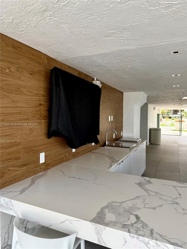 770 Claughton Island Dr Unit 1503, Miami, FL 33131 - detailed view of wood walls and a textured ceiling