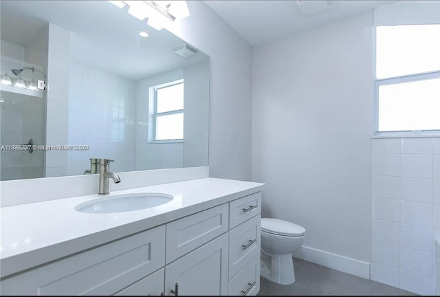 555 E Dania Beach Blvd Unit 5, Dania Beach, FL 33004 - bathroom with vanity, tile patterned floors, and tiled shower