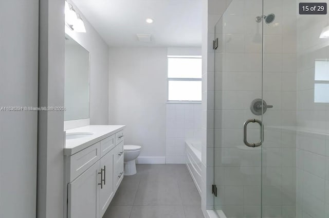 555 E Dania Beach Blvd Unit 5, Dania Beach, FL 33004 - full bath featuring vanity, tile patterned floors, a stall shower, and a garden tub