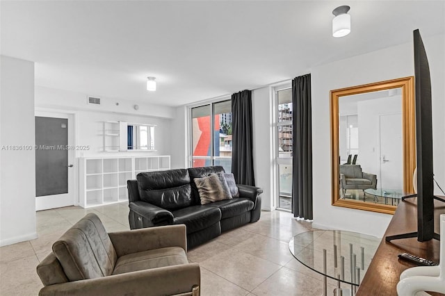 50 Biscayne Blvd Unit 601, Miami, FL 33132 - living room with light tile patterned floors and baseboards