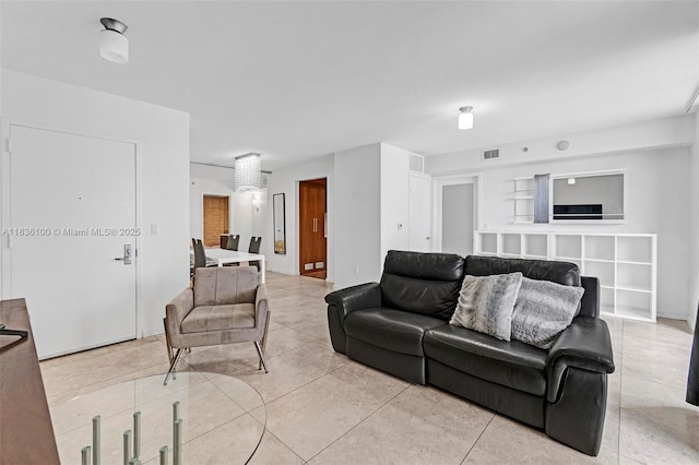50 Biscayne Blvd Unit 601, Miami, FL 33132 - living room with light tile patterned flooring and built in features