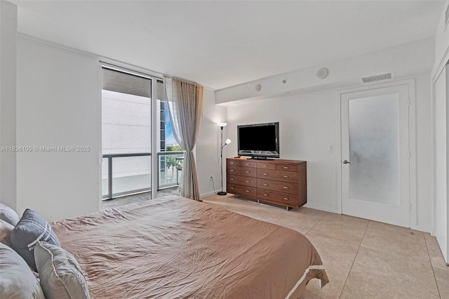 50 Biscayne Blvd Unit 601, Miami, FL 33132 - bedroom featuring light tile patterned flooring and expansive windows