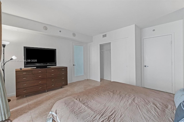 50 Biscayne Blvd Unit 601, Miami, FL 33132 - bedroom with light tile patterned floors and a closet