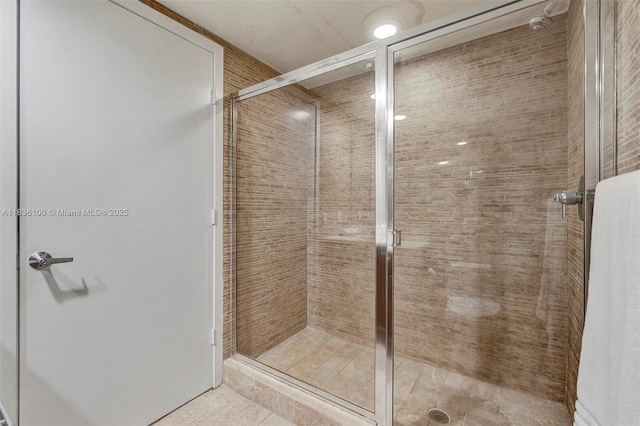 50 Biscayne Blvd Unit 601, Miami, FL 33132 - bathroom featuring a stall shower and tile patterned floors