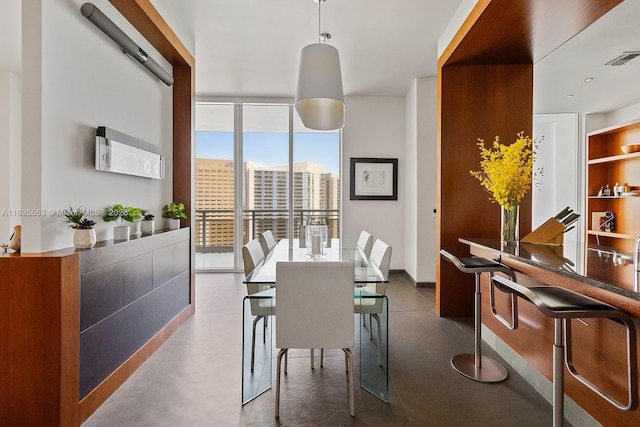 901 Brickell Key Blvd Unit 3607, Miami, FL 33131 - dining room with a wall of windows