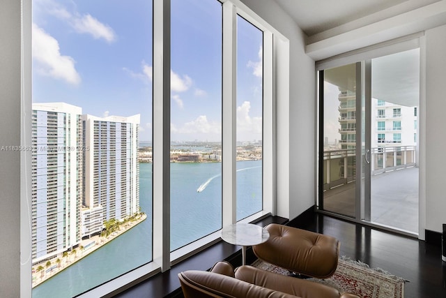 901 Brickell Key Blvd Unit 3607, Miami, FL 33131 - interior space featuring a water view and wood finished floors