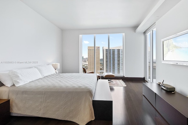901 Brickell Key Blvd Unit 3607, Miami, FL 33131 - bedroom with dark wood-type flooring and a city view