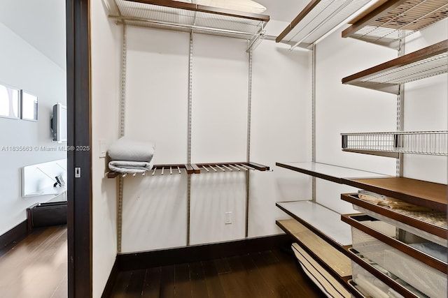 901 Brickell Key Blvd Unit 3607, Miami, FL 33131 - spacious closet featuring wood finished floors
