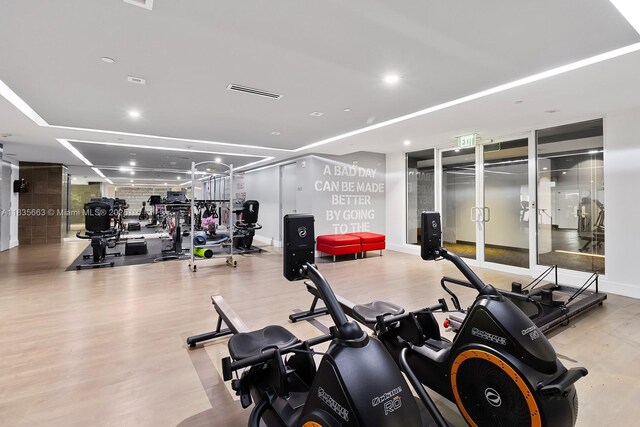 901 Brickell Key Blvd Unit 3607, Miami, FL 33131 - workout area with recessed lighting and a tray ceiling