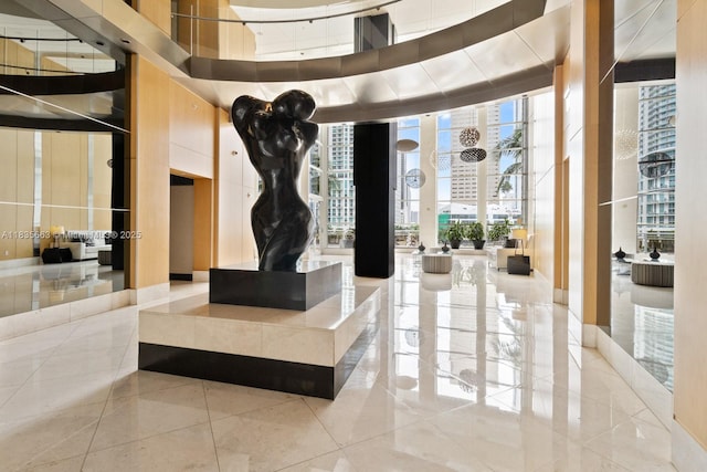 901 Brickell Key Blvd Unit 3607, Miami, FL 33131 - common area with a wall of windows and a towering ceiling