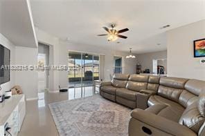 1851 Soaring Hights Cir, Orlando, FL 32837 - living room with a ceiling fan and baseboards