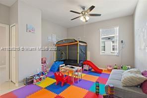 1851 Soaring Hights Cir, Orlando, FL 32837 - recreation room with a ceiling fan