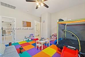 1851 Soaring Hights Cir, Orlando, FL 32837 - game room with ceiling fan