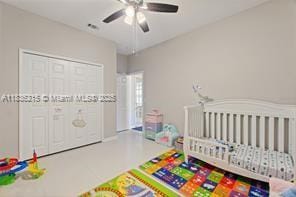 1851 Soaring Hights Cir, Orlando, FL 32837 - bedroom with a ceiling fan