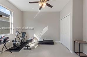 1851 Soaring Hights Cir, Orlando, FL 32837 - exercise area featuring ceiling fan and baseboards
